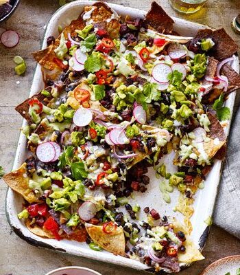 https://www.pontalo.net - Movie night nachos with chorizo & creamy guacamole