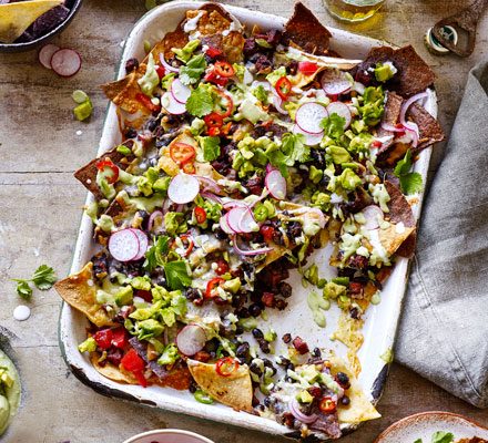 https://www.pontalo.net - Movie night nachos with chorizo & creamy guacamole