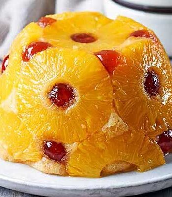 https://www.pontalo.net - Pineapple & cherry sponge with coconut rum custard