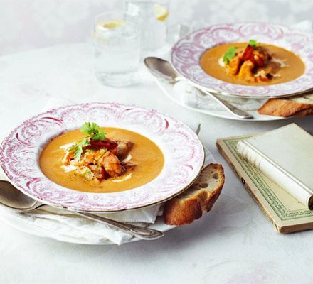 https://www.pontalo.net - Seared garlic seafood with spicy harissa bisque