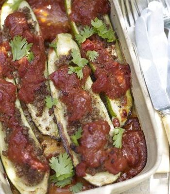 https://www.pontalo.net - Baked courgettes stuffed with spiced lamb & tomato sauce