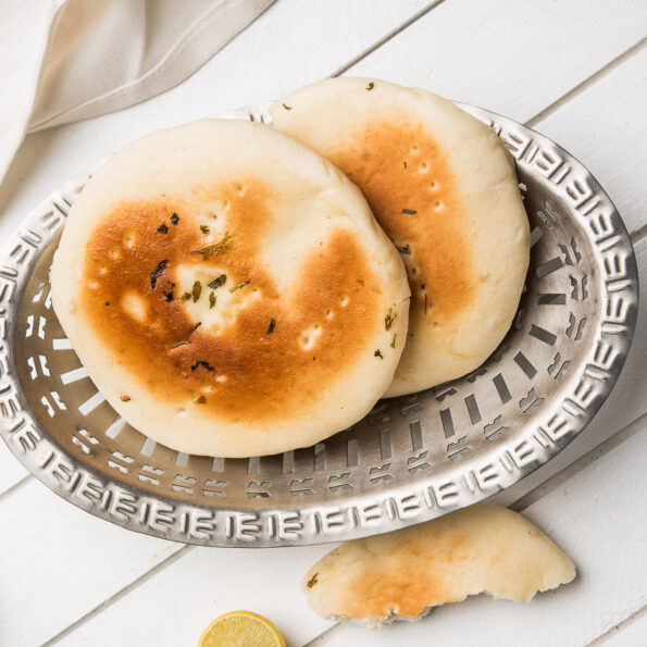 https://www.pontalo.net - Baked Amritsari Kulcha Recipe (Without Yeast)