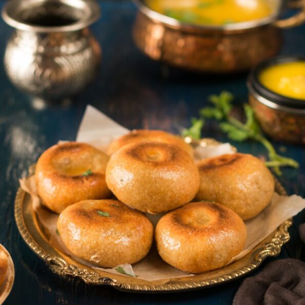 https://www.pontalo.net - Baked Whole Wheat Masala Baati Recipe (Healthy Rajasthani Spiced Wheat Dumplings)