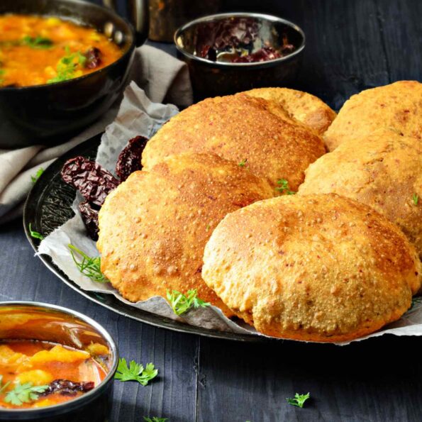 https://www.pontalo.net - Bedmi Poori Recipe - Spiced Split Black Lentil Pooris