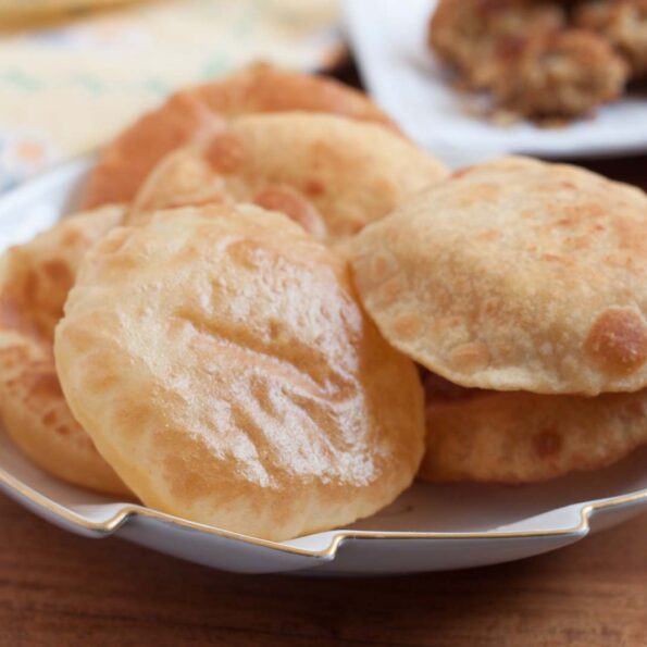 https://www.pontalo.net - Chunni Ki Puri Recipe - Moong Dal And Besan Fried Puri Recipe