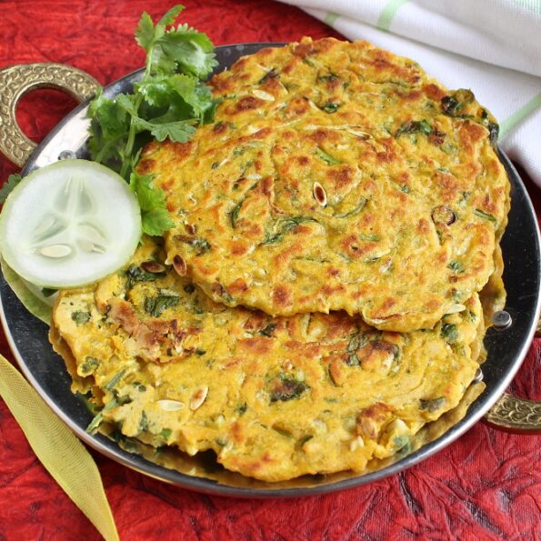 https://www.pontalo.net - Maharashtrian Kakdi Thalipeeth Recipe - Spiced Cucumber Flat Bread