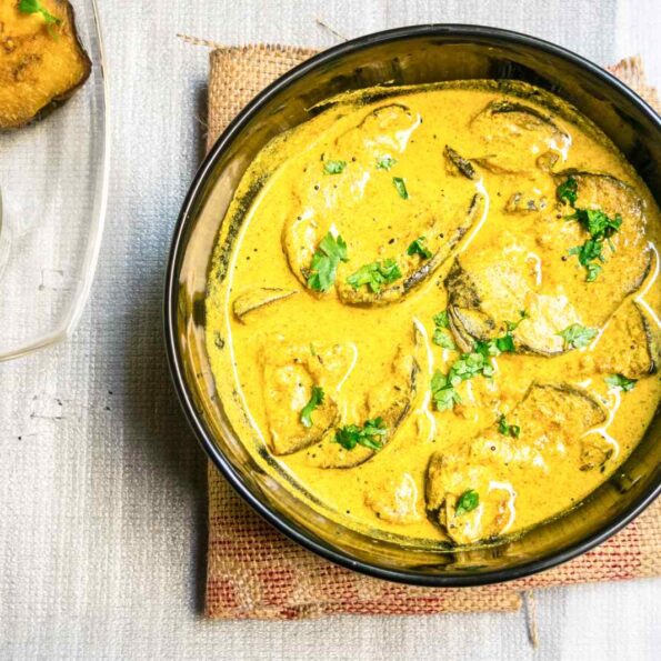 https://www.pontalo.net - Eggplant In Mustard Poppy Seed Yogurt Gravy Recipe-Begun Doi Sorse Posto bata Jhol