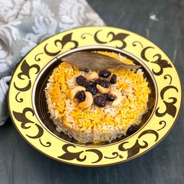 https://www.pontalo.net - Iranian Berry Pulao Recipe With Caramelized Onion & Cranberry