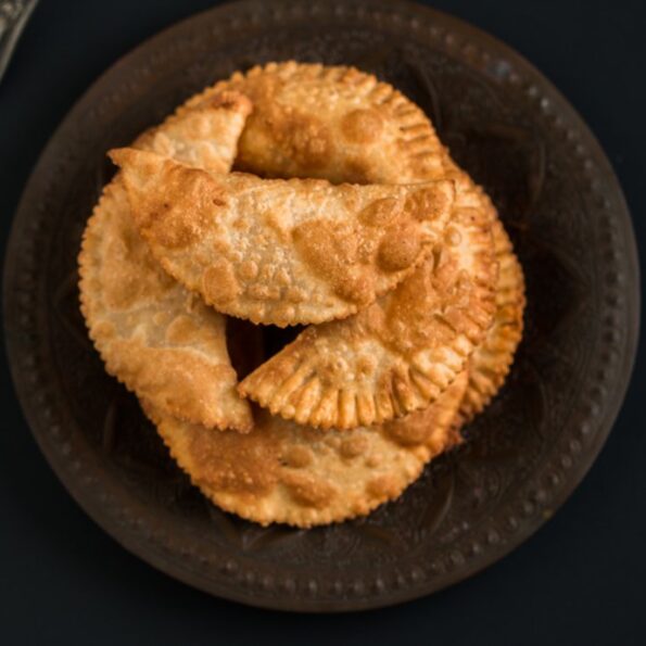 https://www.pontalo.net - Karjikai (Karnataka Style Deep Fried Sweet Pastry Recipe)