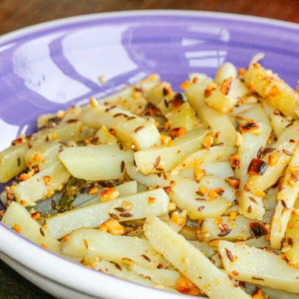 https://www.pontalo.net - Maharashtrian Batatyacha Kees Recipe (Spicy Roasted Potatoes With Peanuts)