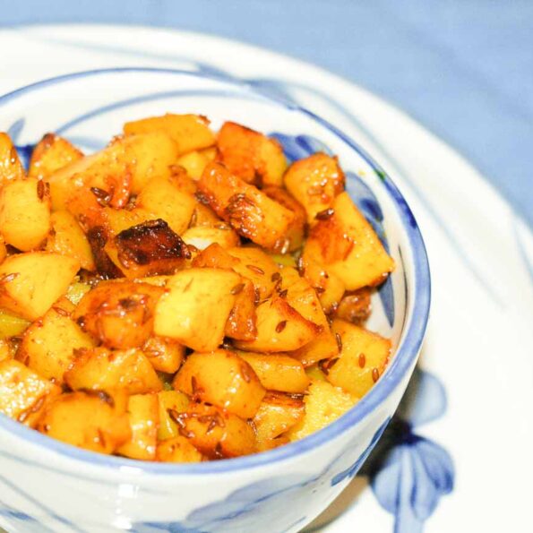 https://www.pontalo.net - Maharastrian Style Kurkure Batate Recipe (Spicy & Crispy Roasted Potatoes)