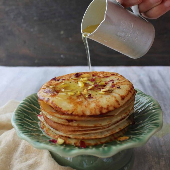 https://www.pontalo.net - Malpua Recipe with Rabri (A Spiced Indian Pancake with Milk Pudding)