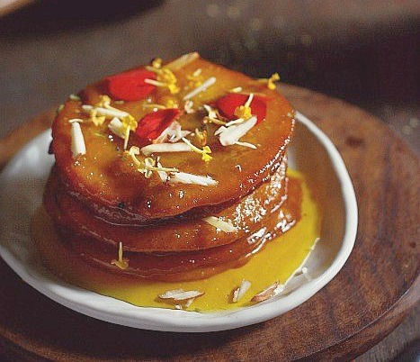 https://www.pontalo.net - Malpua With Rose And Saffron Syrup Recipe