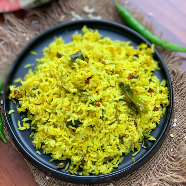 https://www.pontalo.net - Mavinakayi Chitranna Recipe - Spiced Raw Mango Tempered Rice