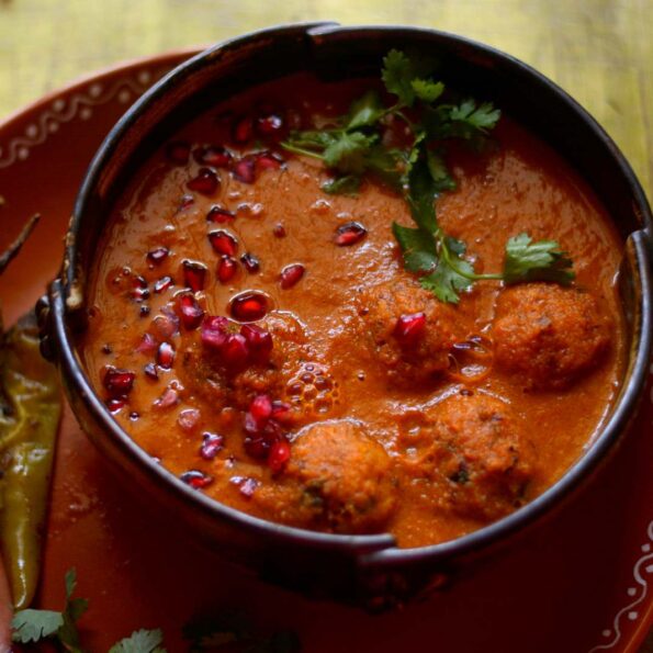 https://www.pontalo.net - Awadhi Moong Dal Ki Goli Recipe - Lentil Dumplings In Tomato Gravy