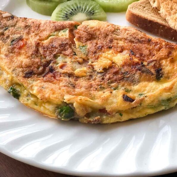 https://www.pontalo.net - Mushroom Masala Cheese Omelette Recipe