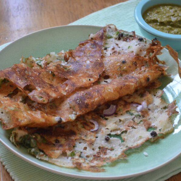 https://www.pontalo.net - Onion Rava Dosa Recipe - Spiced Semolina Crepe