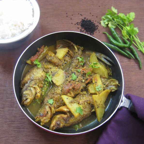 https://www.pontalo.net - Pabda Macher Kalo Jeera Diye Recipe - Bengali Pabda Fish Curry