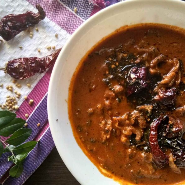 https://www.pontalo.net - Pavakka Theeyal Recipe - Spicy & Tangy Karela In Tamarind Gravy