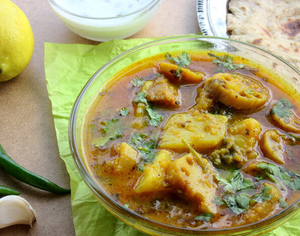 https://www.pontalo.net - Aloo Bhey Ki Sabzi Recipe (Potato Lotus Stem Curry)