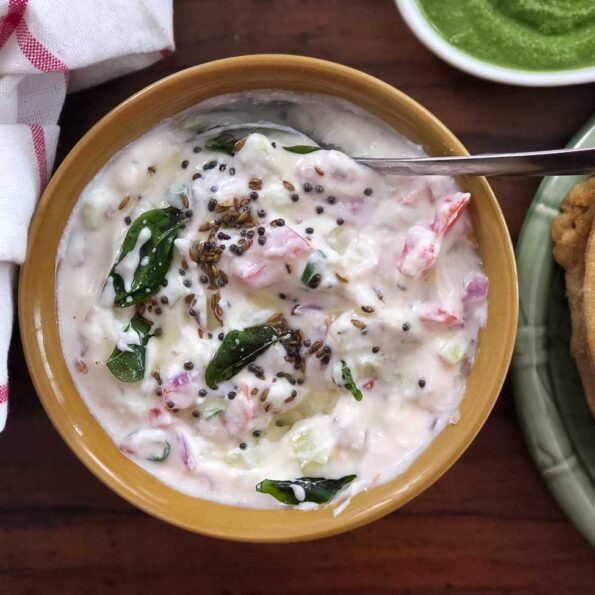 https://www.pontalo.net - Tomato Onion Tadka Raita Recipe