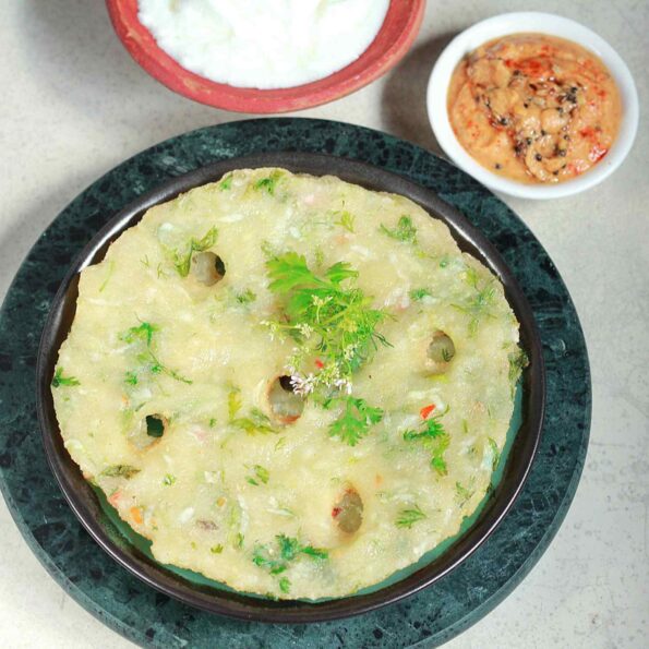 https://www.pontalo.net - Rava Kakdi Thalipeeth Recipe (Maharashtrian Style Semolina-Cucumber Flatbread)