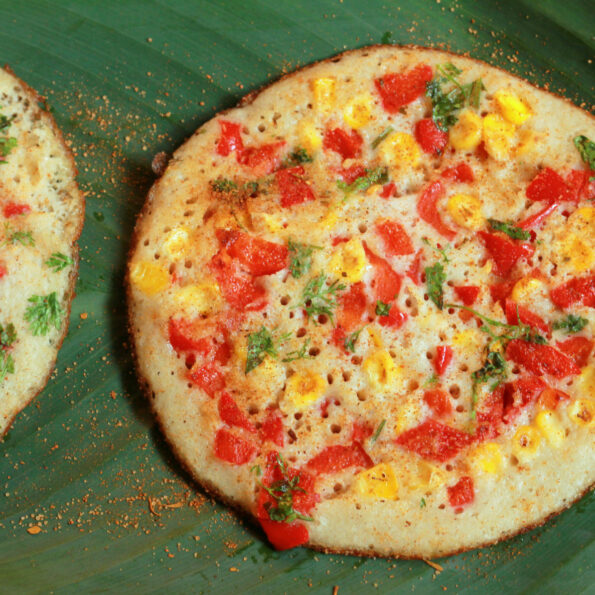 https://www.pontalo.net - Maharashtrian Vegetable Amboli Recipe (Savory Lentil Pancake Topped With Vegetables)