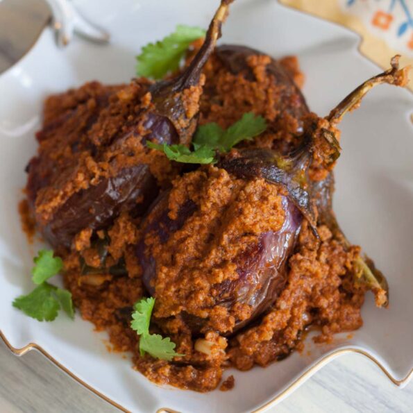 https://www.pontalo.net - Spicy Coconut Peanut Stuffed Baby Brinjal Recipe