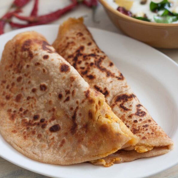 https://www.pontalo.net - Stuffed Arbi Paratha Recipe