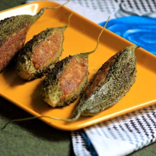 https://www.pontalo.net - Stuffed Karela With Aloo Recipe