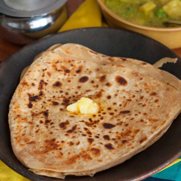 https://www.pontalo.net - Tawa Paratha Recipe - Plain Paratha