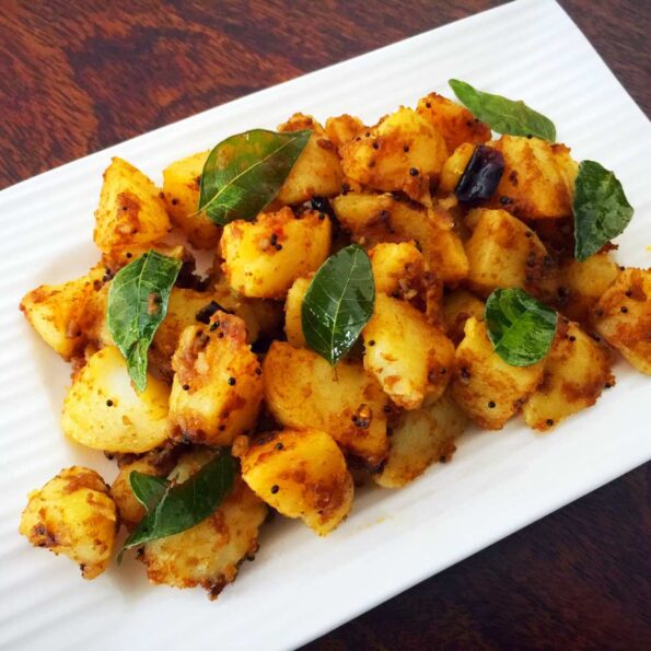 https://www.pontalo.net - Urulaikizhangu Puli Thokku Recipe (South Indian Style Potatoes with Tamarind)