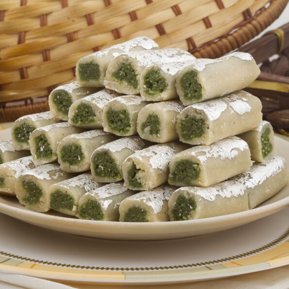 https://www.pontalo.net - Kaju Pista Roll Recipe - Cashew Nut Pistachio Fudge