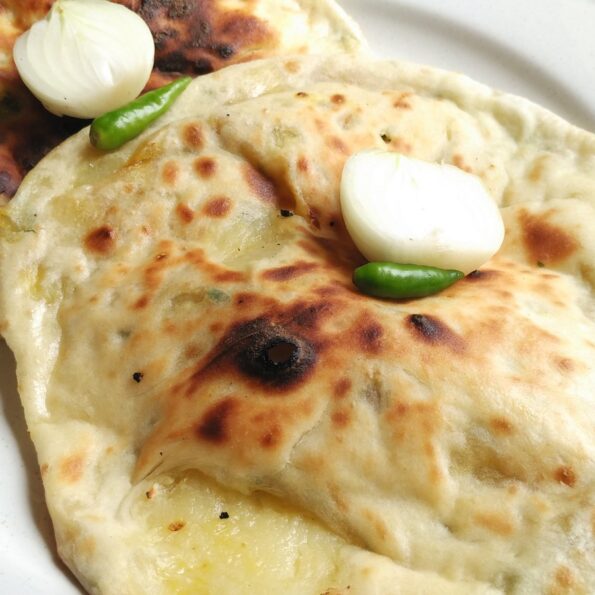 https://www.pontalo.net - Spicy Aloo Naan Recipe